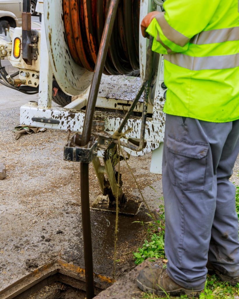 machine-for-cleaning-sewer-wells-in-the-a-town-str-2022-11-12-10-00-52-utc-min-scaled.jpg